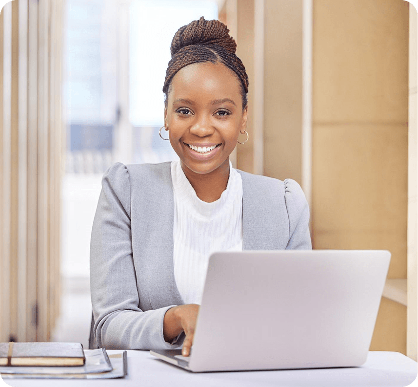 Business owner working at laptop